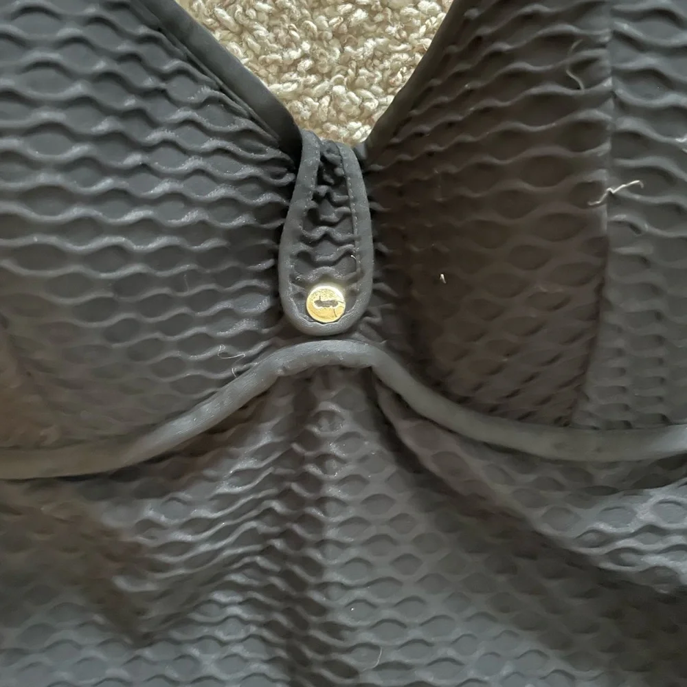 Black one piece with gold detail- no tag